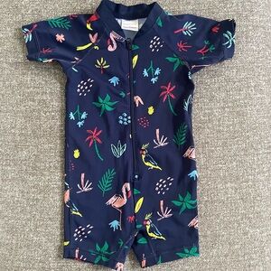 Hanna Andersson Navy Kids Swim Romper with Tropical Print